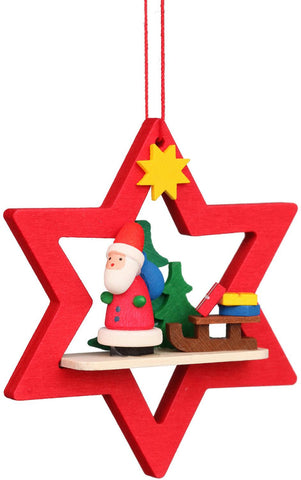 German Christmas Ornament: Star with Santa & Sled