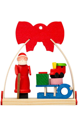 German Christmas Ornament: Bow Arch with Santa & Toys on Sled