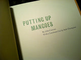 Putting Up Mangoes by John Cutrone